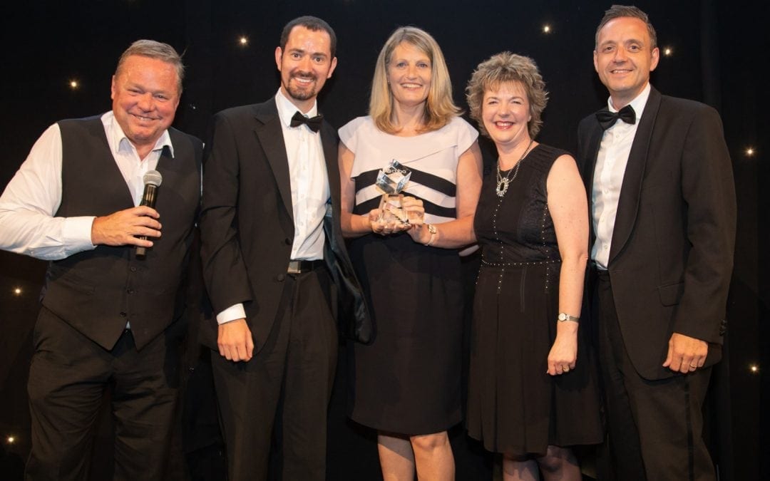 Business Partner winner 2018 NCAUoM on stage